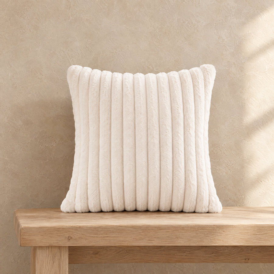 Dune Ribbed Cushion Cover on a cushion standing on an oak bench